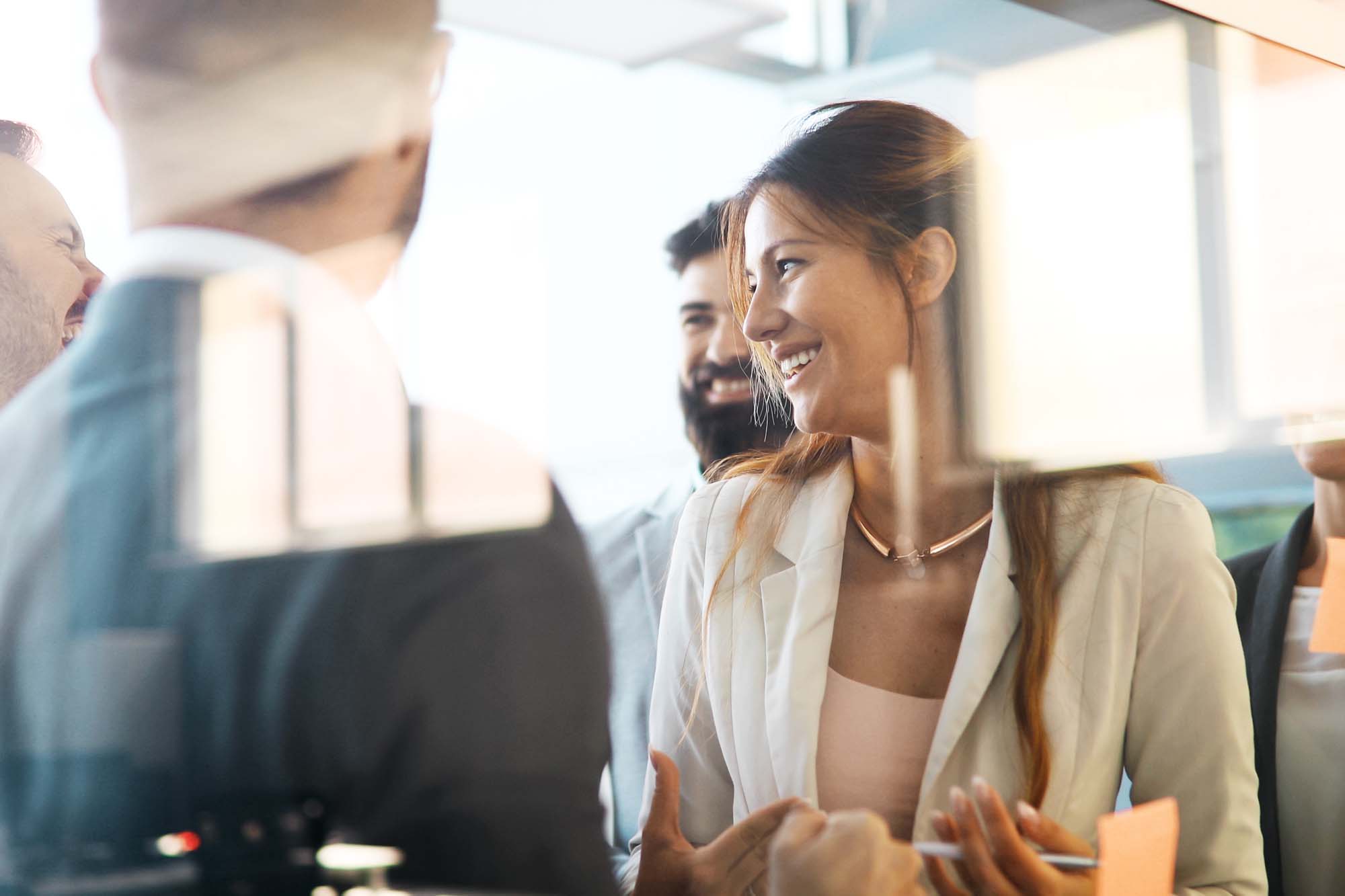 Collaboration and analysis by business people working in office